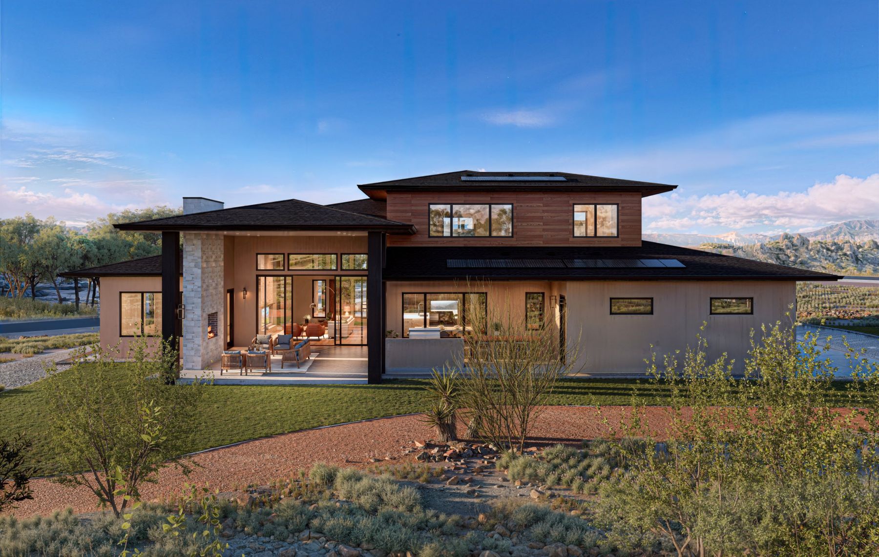 Rear of the home with the open patio and lawn